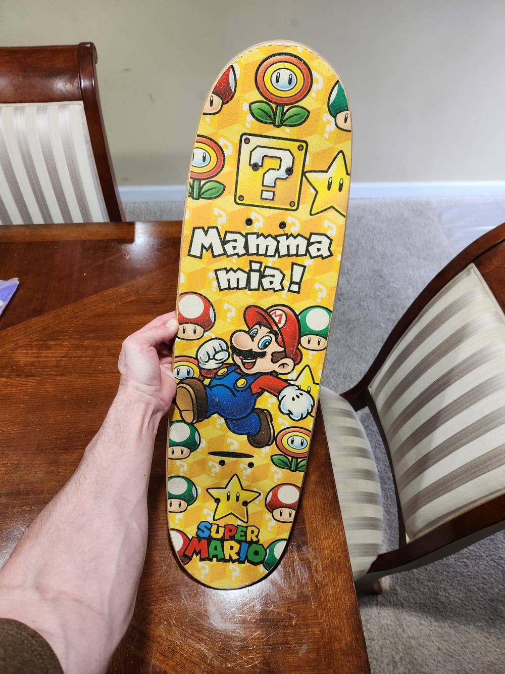 Nintendo Yellow Super Mario Mamma Mia! Skateboard Deck